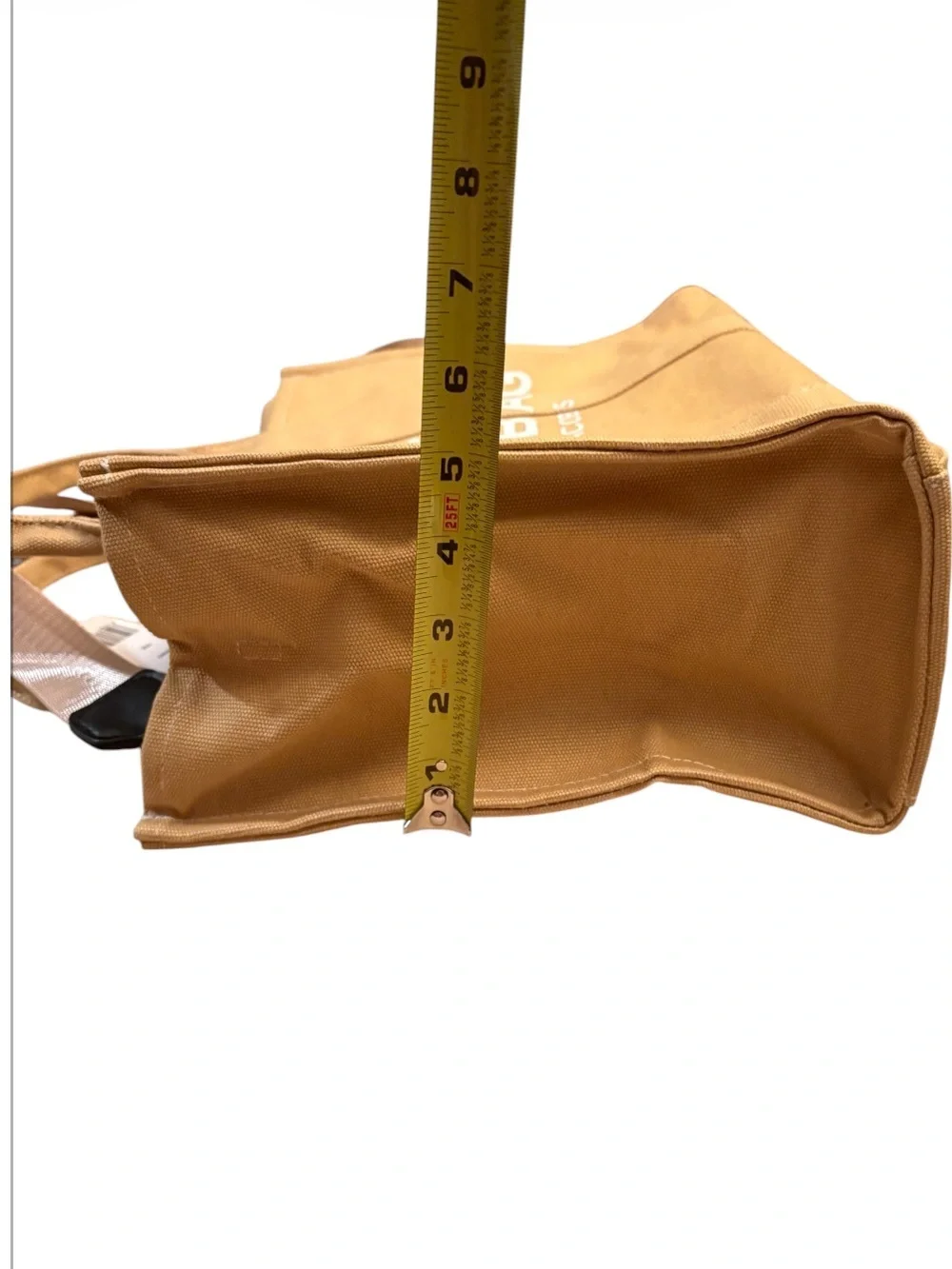 Marc Jacobs The Jacquard Tote Bag in the color Camel.